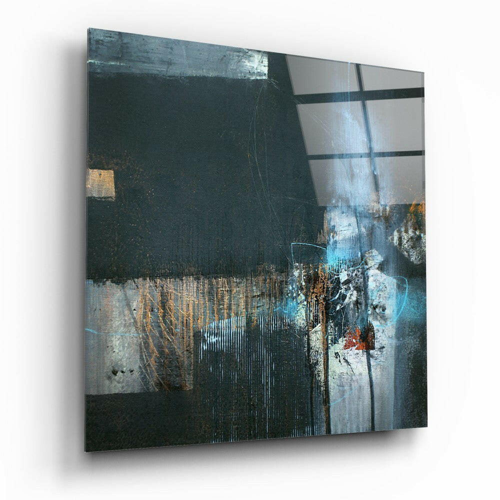 Abstract glass wall art panel with dark teal, gold, and turquoise layers featuring geometric lines and weathered texture effects, mounted at an angle.