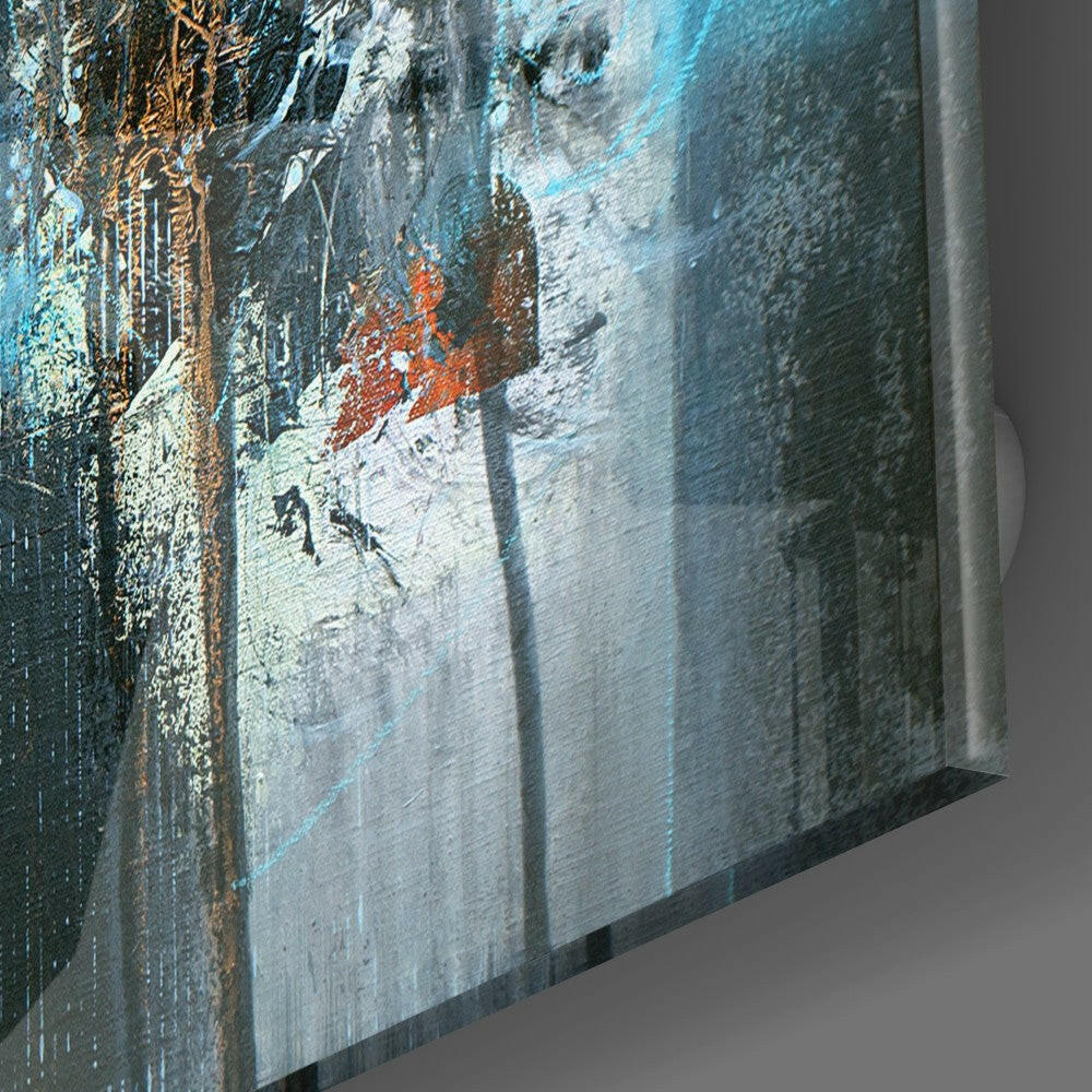 Close-up angled view of glass wall art showing weathered blue, white, and rust-colored textured surface with shadow detail on right edge.