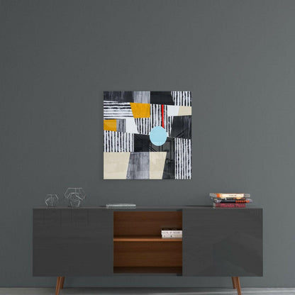 Abstract glass wall art with striped patterns, geometric shapes in black, white, cream, yellow, and light blue circle, displayed above mid-century modern credenza.