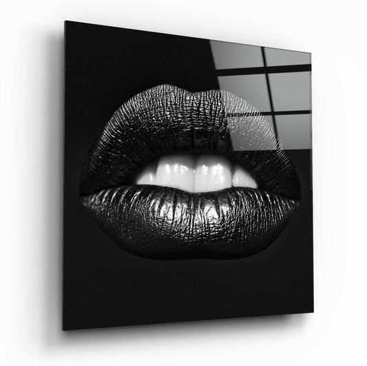 Black Lips Glass Wall Art displayed at an angle showing glossy black glass panel with white teeth detail and grid pattern overlay on upper right.
