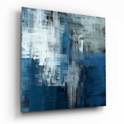 Abstract blue and white glass wall art with vertical striations and layered brushstroke texture, angled perspective view.