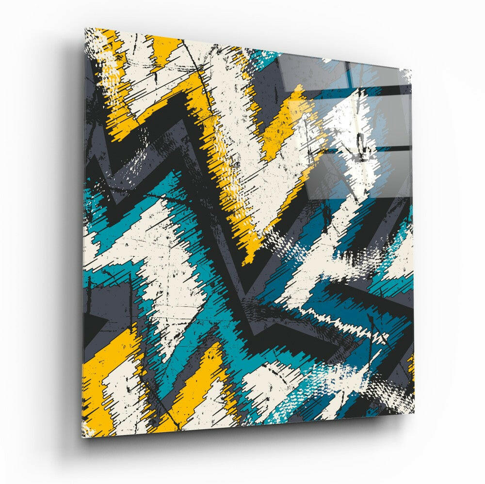 Modern glass wall art featuring abstract geometric design with yellow, teal, white, and gray brushstroke patterns.