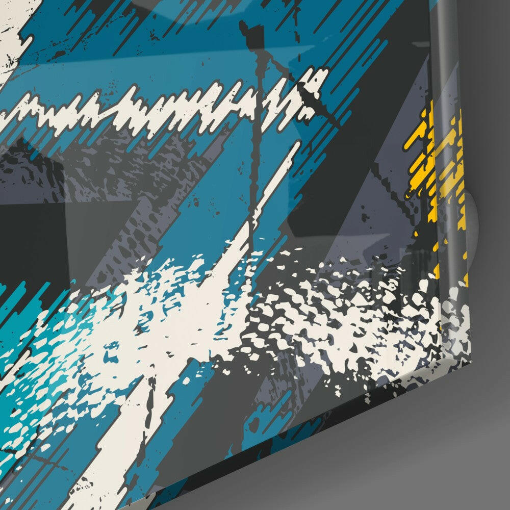 Abstract glass wall art featuring bold turquoise, white, cream, and yellow brushstroke design on angled surface.