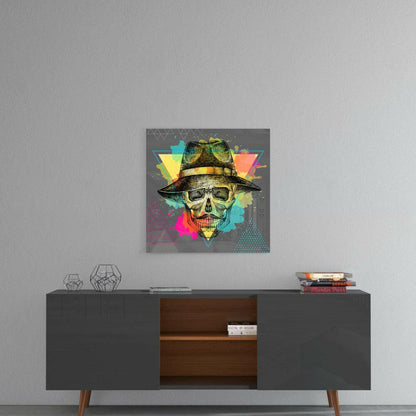 Colorful pop art skull wearing a fedora hat displayed on gray wall above mid-century modern console table.