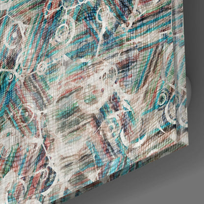 Close-up angled view of textured glass surface displaying layered turquoise, coral, and cream abstract patterns with white decorative elements.