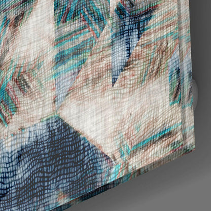Close-up of textured glass art showing layered turquoise, navy, coral, and cream brushstroke patterns with visible weave texture.