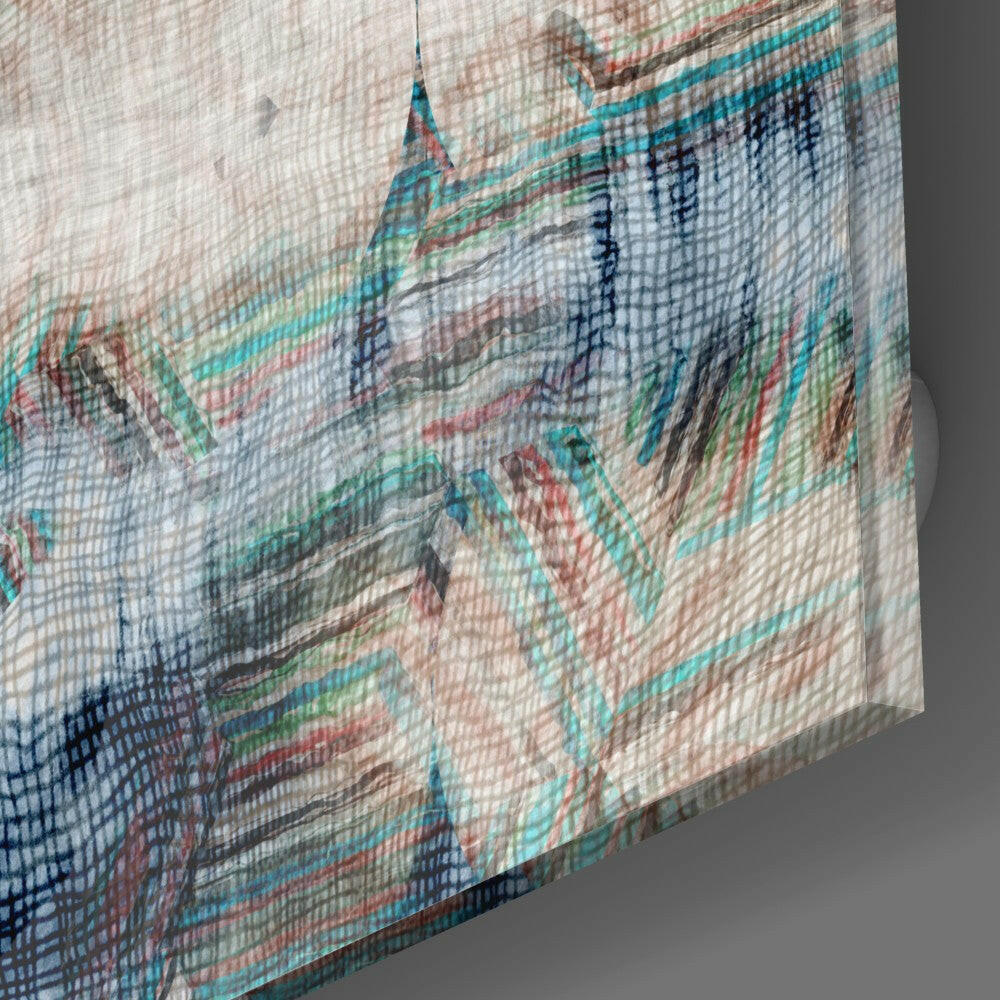 Close-up angled view of textured glass wall art showing layered abstract architectural imagery in turquoise, coral, navy, and cream tones.
