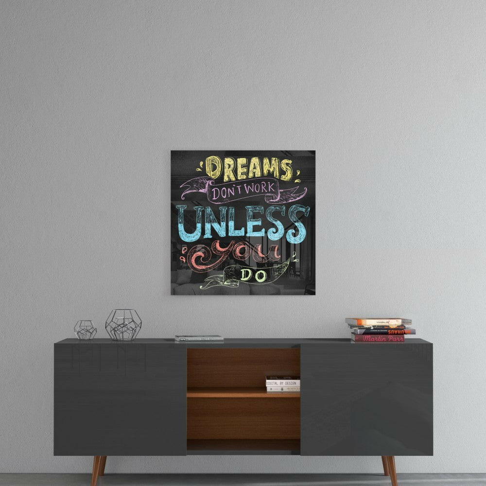 Motivational chalkboard-style canvas mounted on gray wall above mid-century modern credenza with geometric décor.