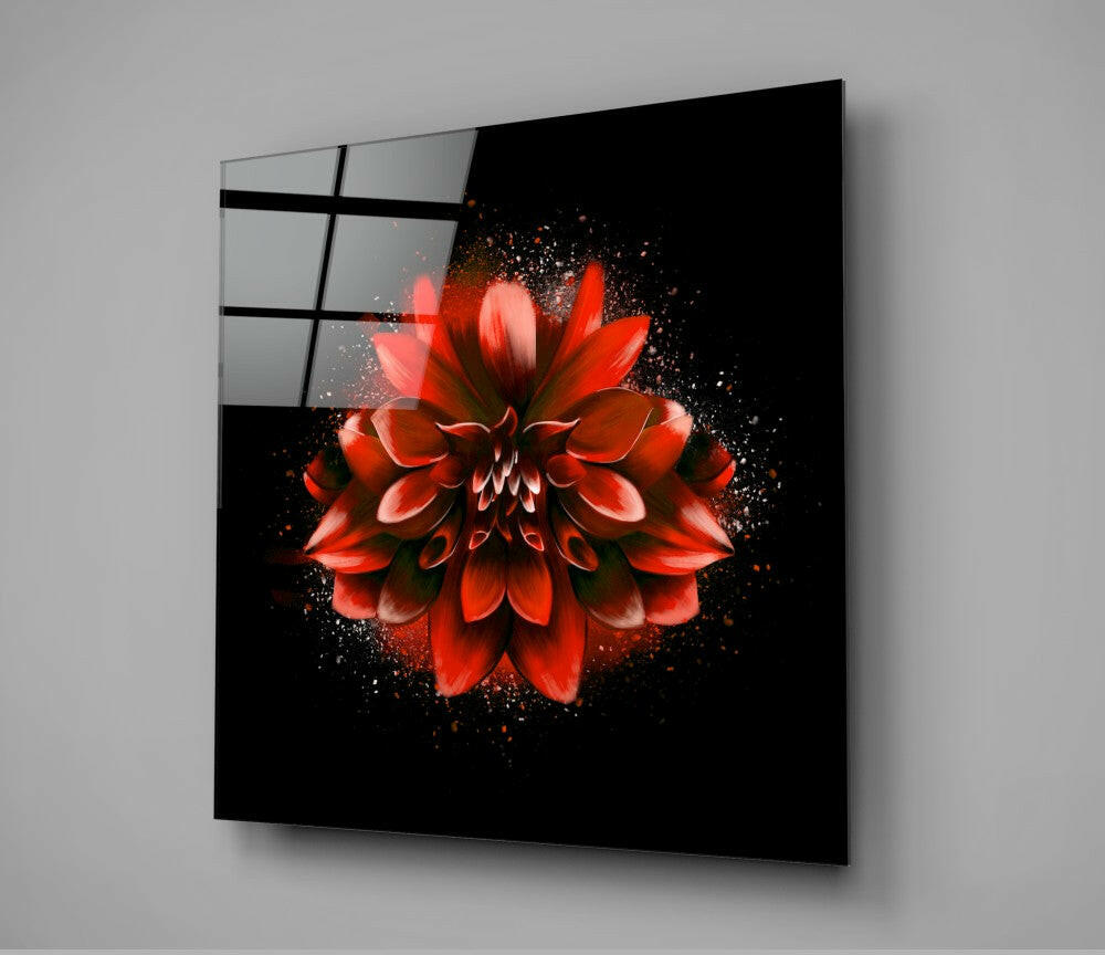Red lotus flower with particle explosion effect on black glass panel mounted at angle, showing grid pattern on left edge.