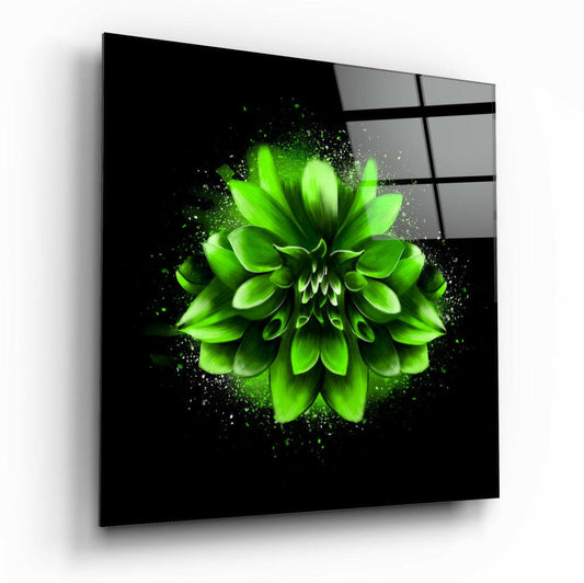 Angled view of a square glass wall panel displaying a vibrant neon green flower with particle effects on black background.