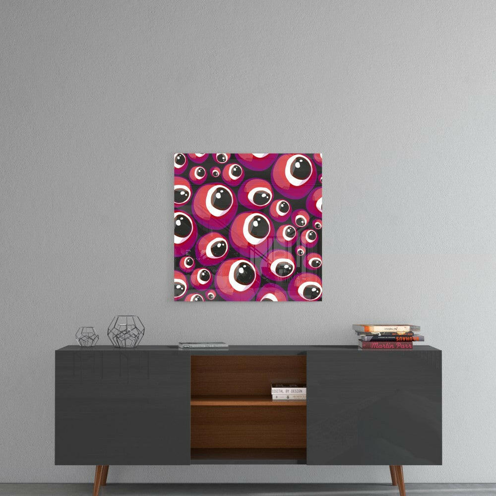 Red and pink evil eye beads glass art displayed on gray wall above dark mid-century modern credenza.
