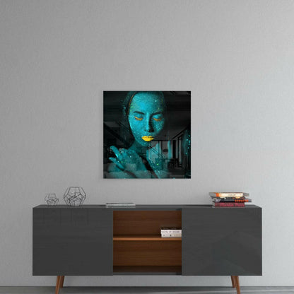 Emerald Woman Glass Wall Art displayed on gray wall above mid-century credenza, showing turquoise face with gold lips and black background.