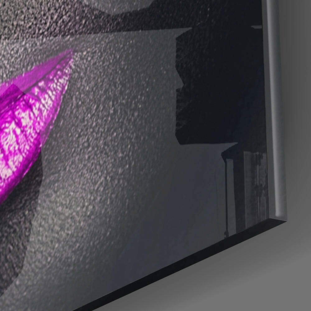 Close-up angled view of pink glittery lash design on textured glass wall art panel.