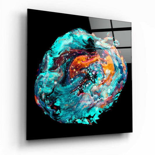 Angled view of a square glass wall art piece displaying a swirling spherical orb in turquoise, orange, and dark colors against a black background.