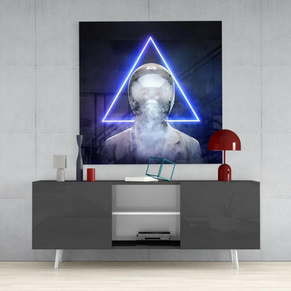 Neon blue triangle framing an astronaut's head with smoke effect, displayed above a gray media console with red accents.