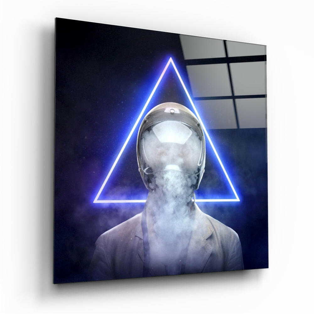 Glass wall art depicting a figure with obscured face and smoke effect, framed by glowing blue neon triangle, displayed at angle.