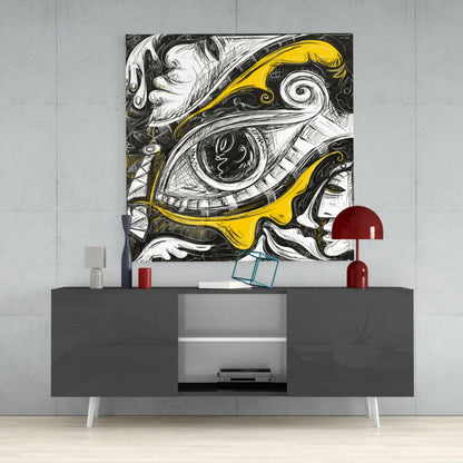 Black and white line art with yellow accents depicting an ornate eye, displayed above a gray media console with red dome lamps in a modern interior setting.