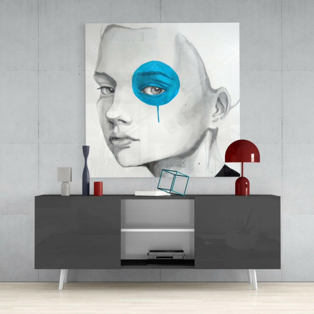 Modern interior display featuring Blue Look Glass Wall Art mounted above a gray media console with red decorative accessories and geometric objects.