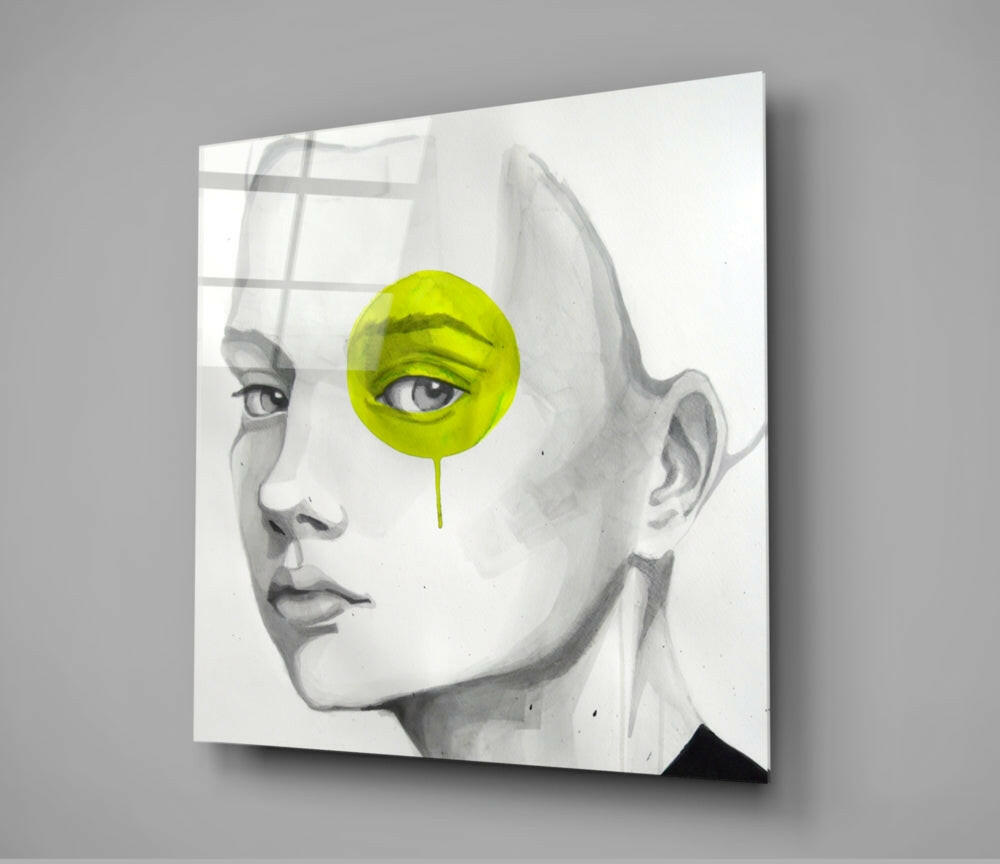 Canvas wall art featuring a pencil-drawn female profile with a bright yellow circular overlay covering one eye, displayed at an angle against gray background.