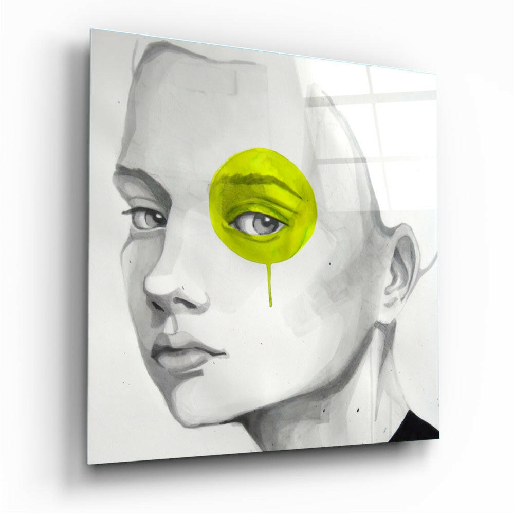 Profile view of grayscale portrait with bright lime-yellow circular overlay covering one eye, dripping downward onto canvas wall art.