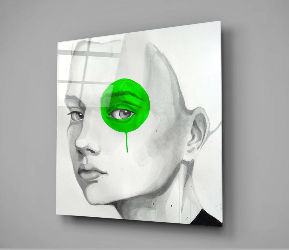 Canvas wall art displaying a pencil-drawn female face profile with a bright green circular overlay covering one eye.