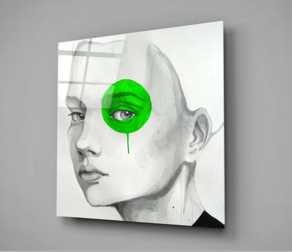 Canvas wall art displaying a pencil-drawn female face profile with a bright green circular overlay covering one eye.