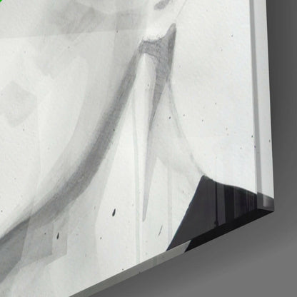 Close-up angled view of frosted glass wall art showing etched geometric line design in gray and white tones.