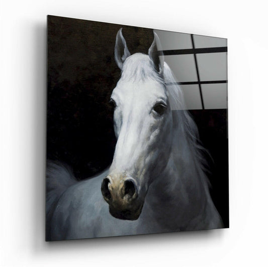 White horse head portrait on glass wall art displayed at an angle, showing dark background and window frame reflection.