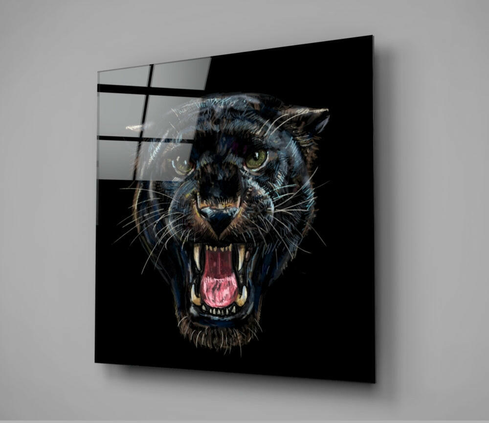 Black glass wall panel featuring a snarling jaguar with bared fangs and golden eyes against dark background, mounted on gray wall.