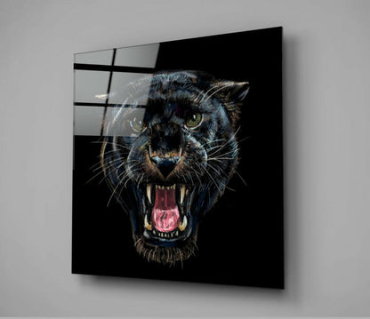 Black glass wall panel featuring a snarling jaguar with bared fangs and golden eyes against dark background, mounted on gray wall.