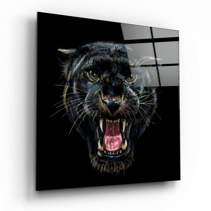 Black jaguar head with open mouth and yellow eyes on dark background, displayed on glass panel with grid overlay.