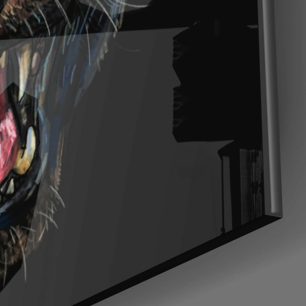 Side profile view of black glass wall art featuring colorful jaguar head with red and yellow markings against dark background.