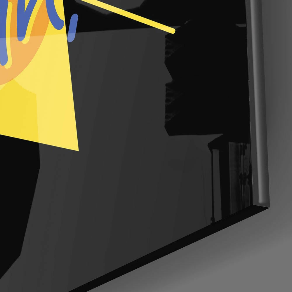 Close-up view of yellow glass panel with blue brushstroke design against dark interior wall.