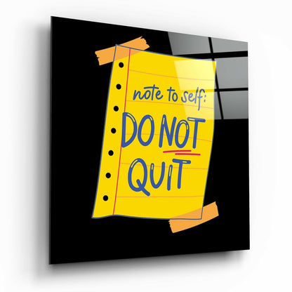 Yellow spiral notebook-style glass panel with blue "DO NOT QUIT" text and orange tape, angled perspective view on black background.