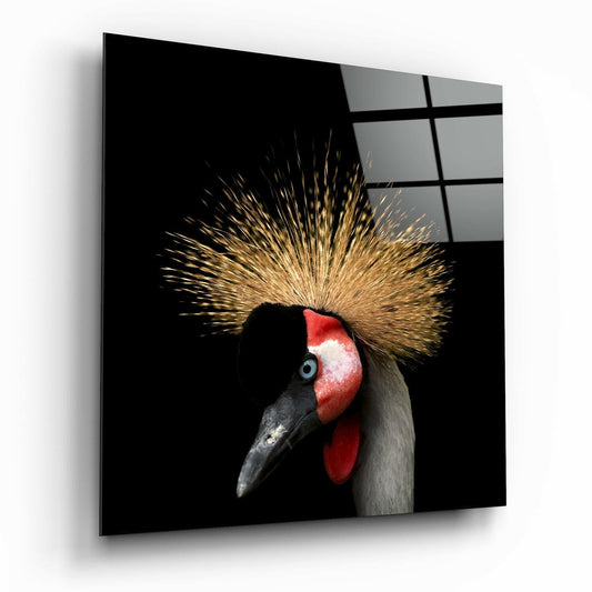 Close-up profile of a crowned crane with distinctive red facial patch, dark beak, and golden spiky crest against black background on canvas.