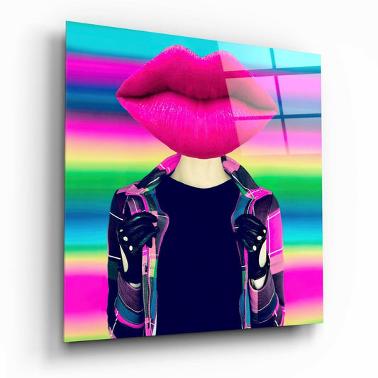 Vibrant glass wall art featuring a figure with oversized magenta lips for a head, wearing a colorful jacket against a rainbow gradient background.