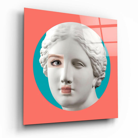 White classical female bust sculpture with modern makeup details on coral and teal circular background glass panel, angled three-quarter view.