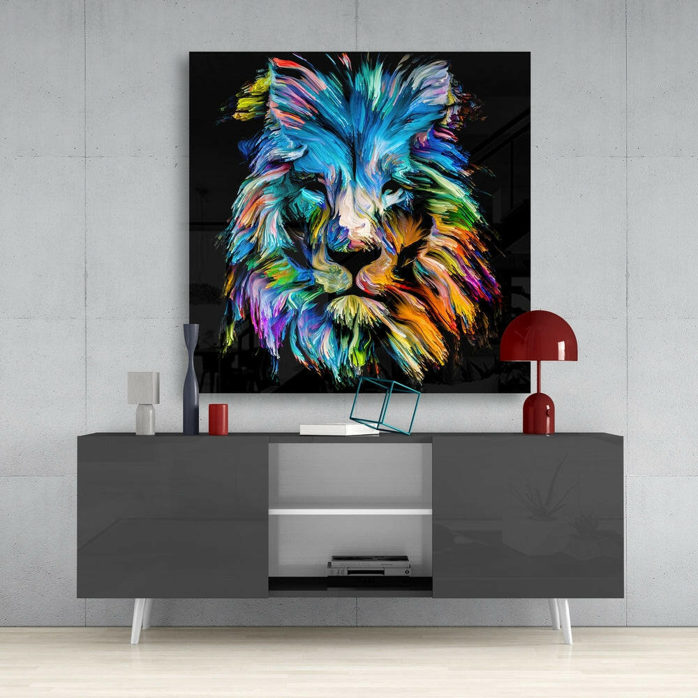 Colorful lion head glass wall art displayed above gray media console in modern living room setting.