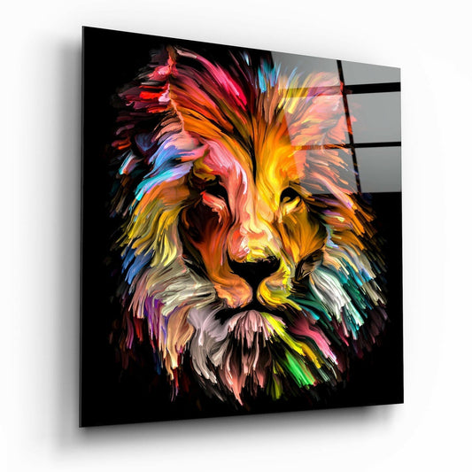 Angled perspective of a colorful lion head glass wall art with vibrant brushstroke-style paint effects in pink, yellow, blue, and orange against black background.