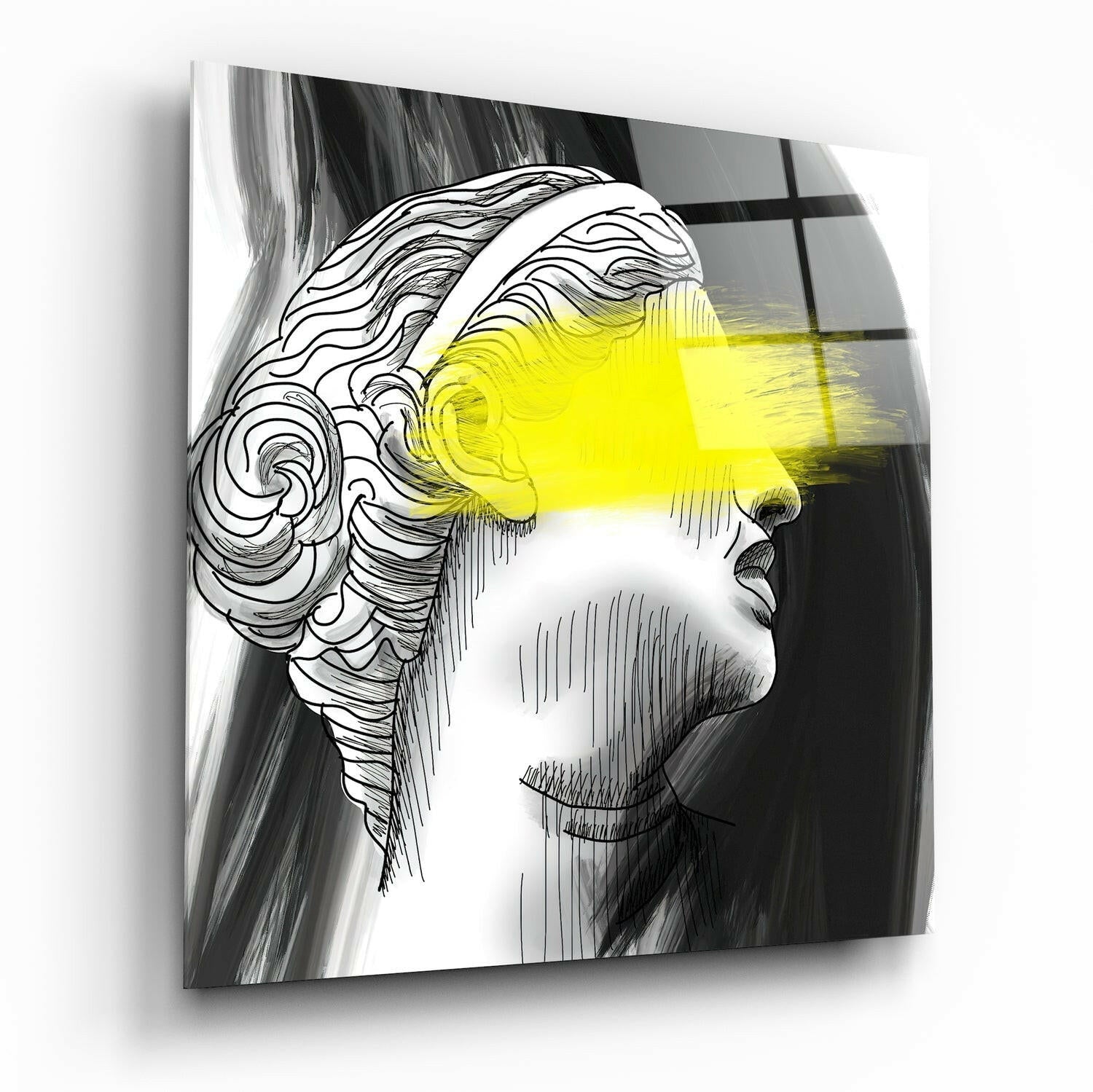 Glass wall art featuring a profile line drawing of a head with bright yellow light beam crossing the face, mounted at an angle.