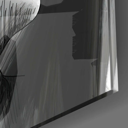 Close-up angled view of translucent glass panel with etched linear patterns and dark silhouette profile, backlit by bright window light.