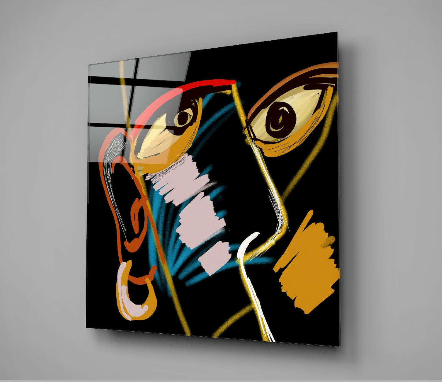 Angled view of glass wall art featuring abstract stylized bird heads in gold, red, orange, and blue against black background with geometric line details.