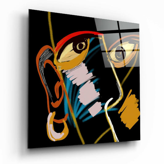 Abstract glass wall art featuring stylized face profile with gold, orange, red, and teal colors on black background, displayed at angle.