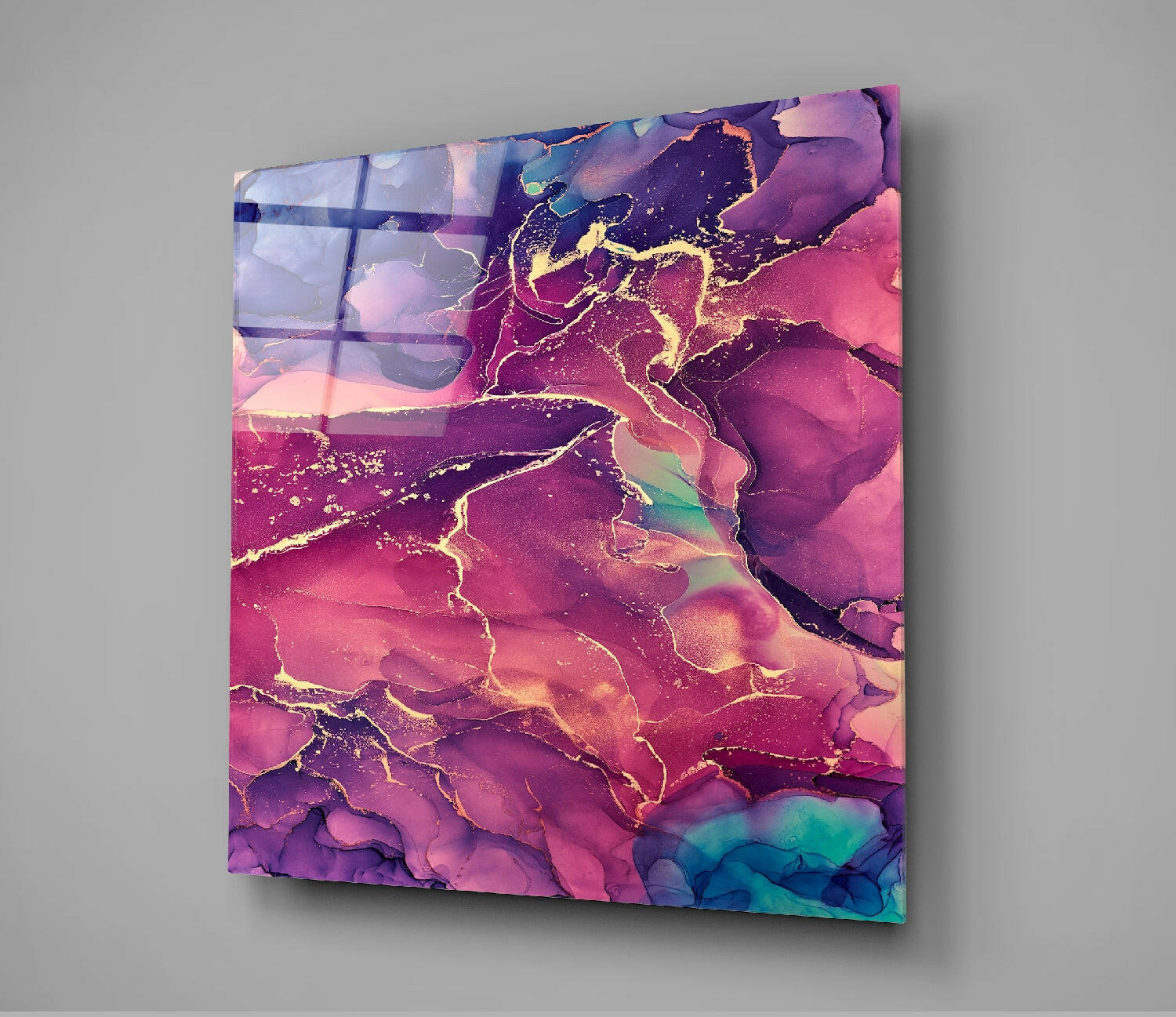 Square glass wall art displaying a vibrant abstract map of Europe with pink, purple, and gold veining, mounted on gray wall.