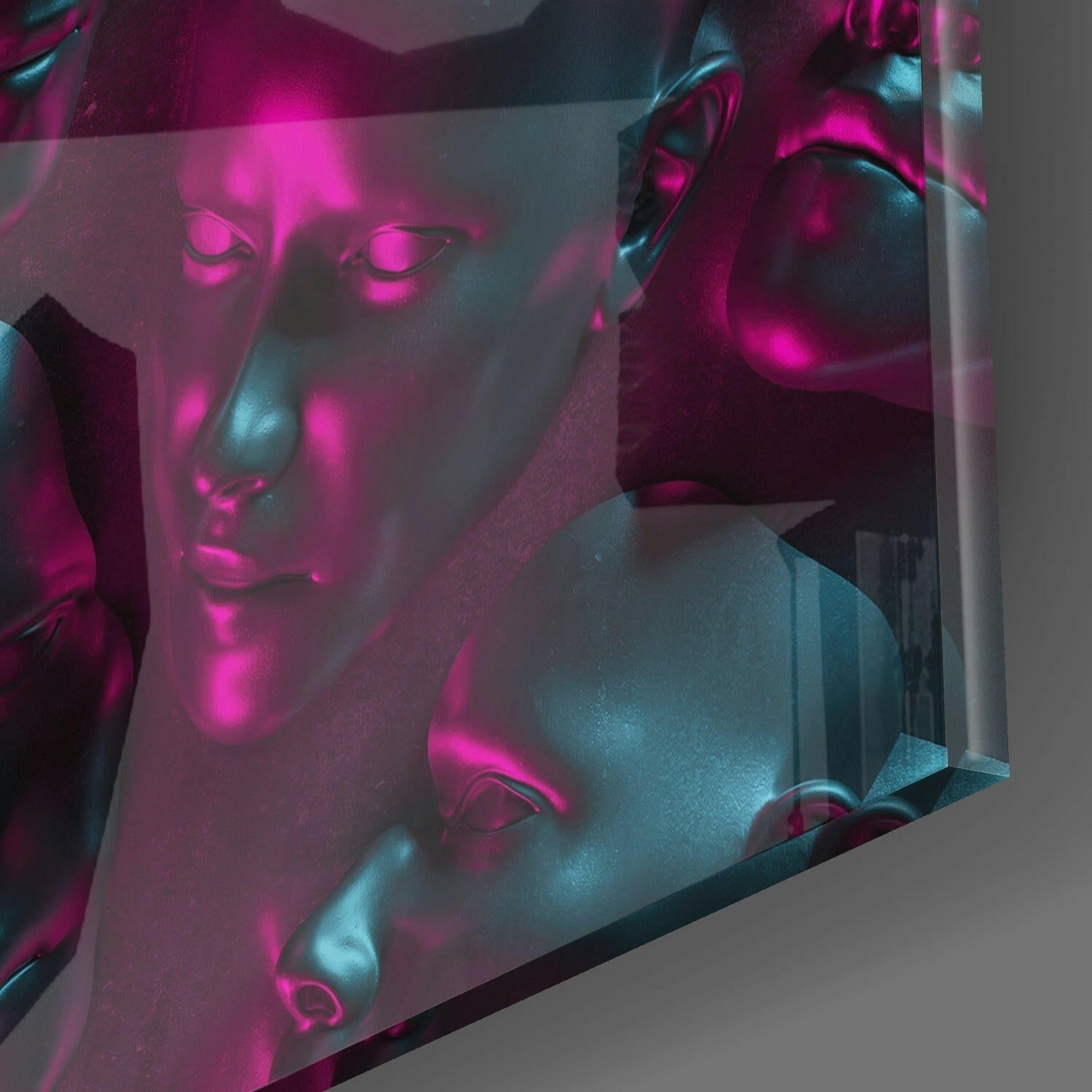 Multiple translucent glass faces illuminated with magenta and cyan neon lighting, angled perspective view.