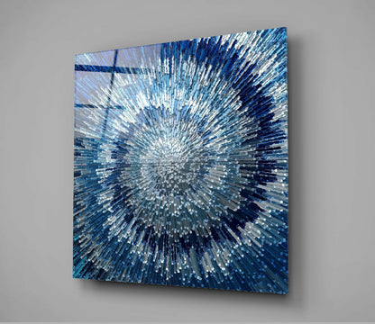 Angled perspective view of square blue glass wall art with radiating white and navy striped pattern emanating from center point.