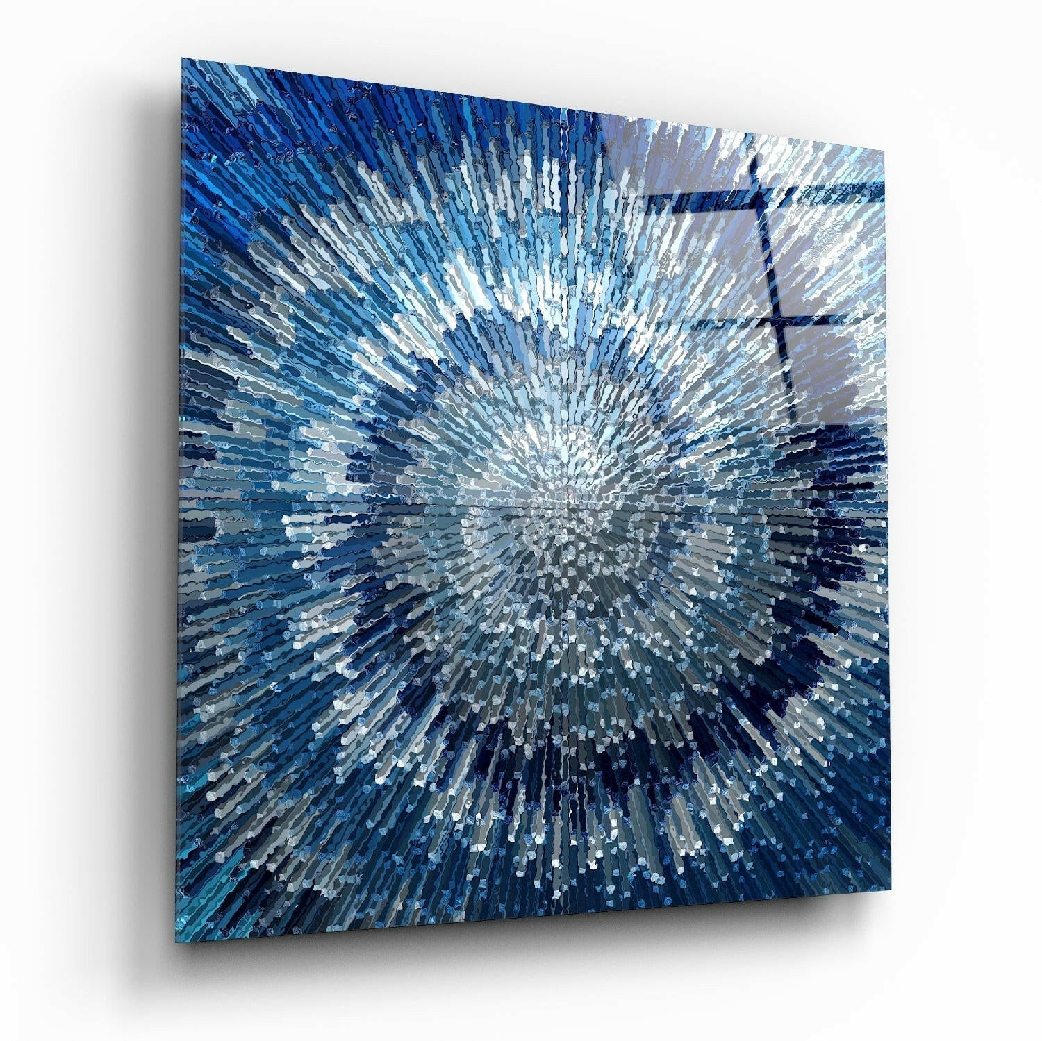 Blue glass wall art panel displaying radial striped pattern in shades of white, light blue, and dark blue, photographed at an angle against white background.