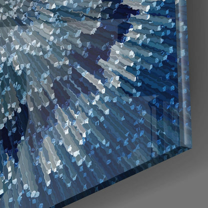 Close-up angled view of blue glass wall art with layered translucent squares in varying shades of blue and white.