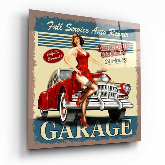 Vintage-style metal garage sign featuring a pinup woman in red dress leaning against a red car, with distressed edges and blue, cream, and red colors.