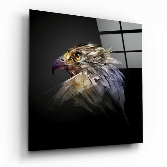 Glass wall art displaying a falcon head in profile with golden eye and purple-toned feathers against dark background, shown at an angle.